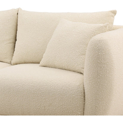Deann Sofa by Arch & Plane. Made from boucle fabric in a unique style.