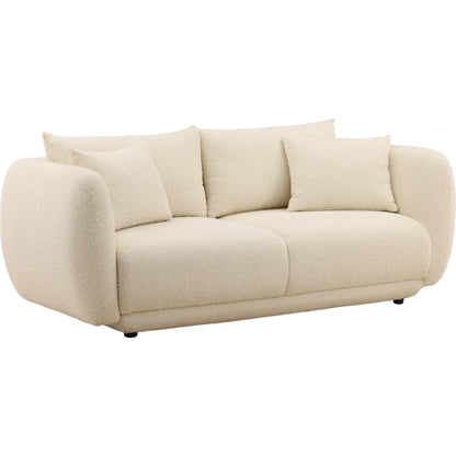 Deann Sofa by Arch & Plane. Made from boucle fabric in a unique style.