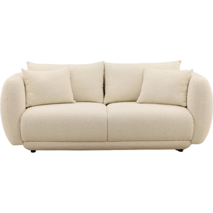 Deann Sofa by Arch & Plane. Made from boucle fabric in a unique style.
