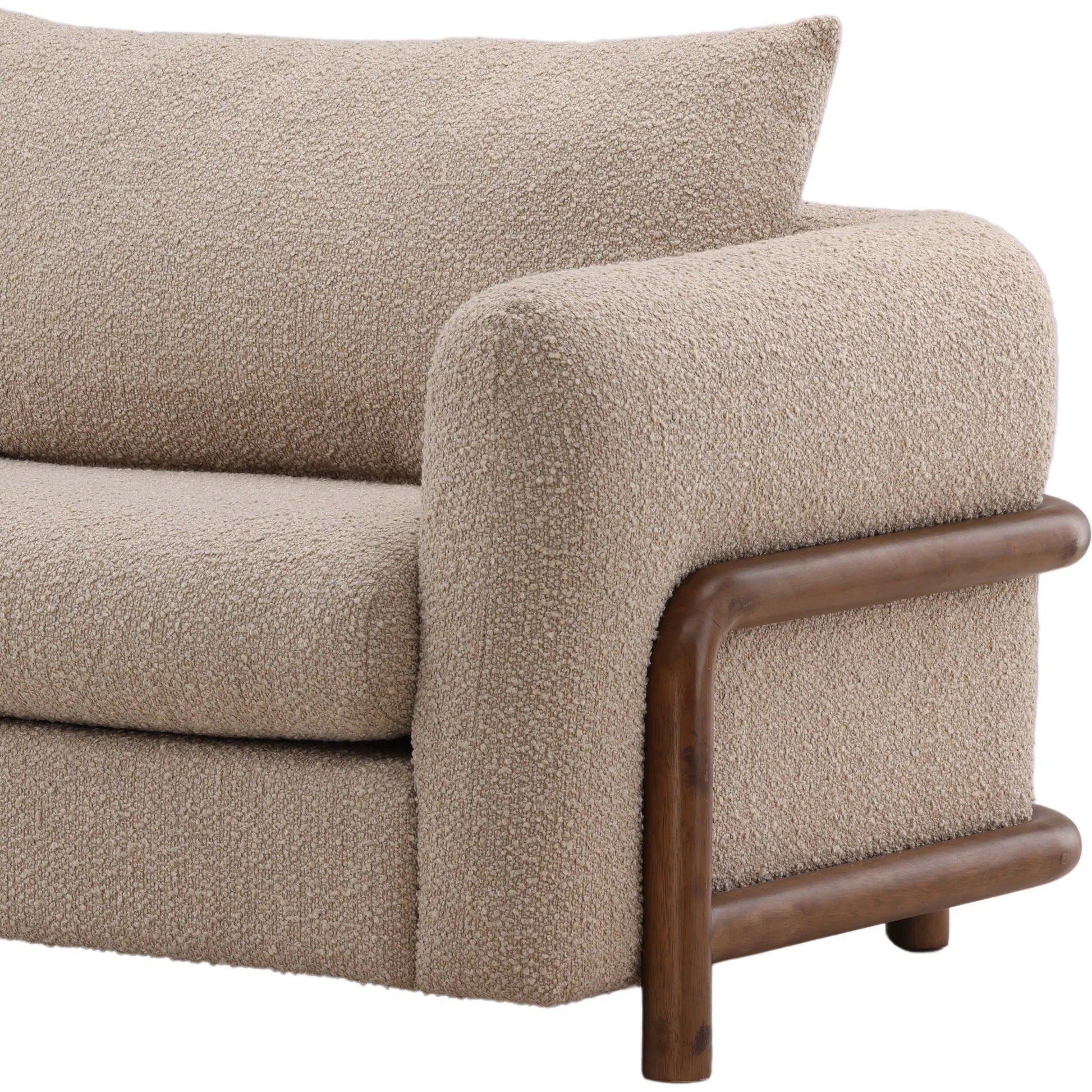 Neil Sofa by Arch & Plane in olana sand, brown. Made from boucle fabric, rubber wood in a unique style.