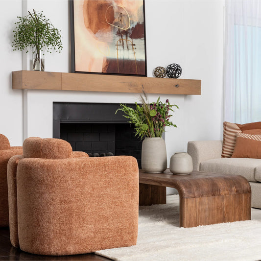 Wynne Coffee Table by Arch & Plane in medium brown. Made from mindi wood in a unique style.