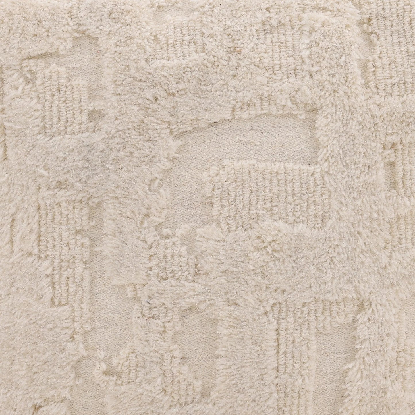 003 SI-2350911 | Closeup | Winter Pouf by Arch & Plane in ivory. Made from handwoven wool in a rustic style.