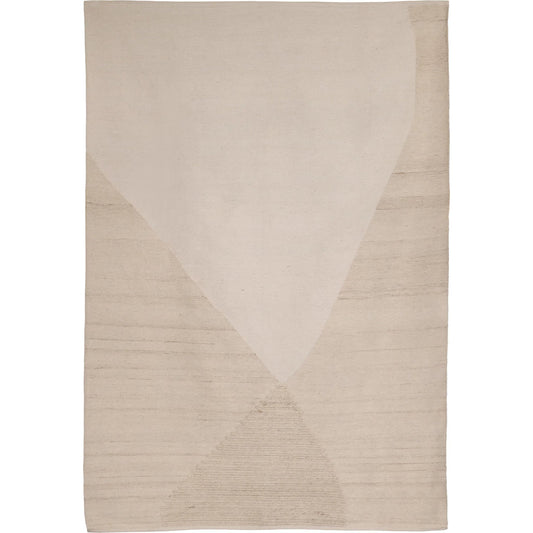 Clemente Rug by Arch & Plane in ivory. Made from handwoven wool blend in a unique style.