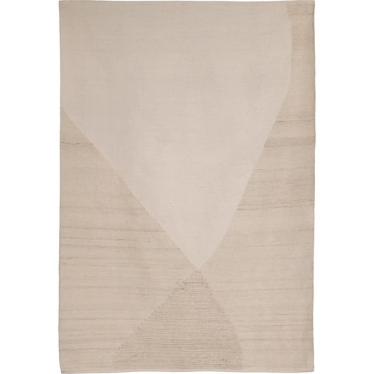 Clemente Rug by Arch & Plane in ivory. Made from handwoven wool blend in a unique style.