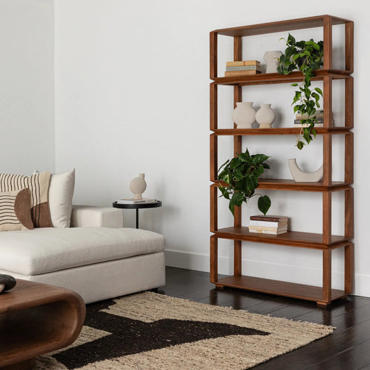 Fresno Bookcase by Arch & Plane in medium brown. Made from acacia wood in a unique style.