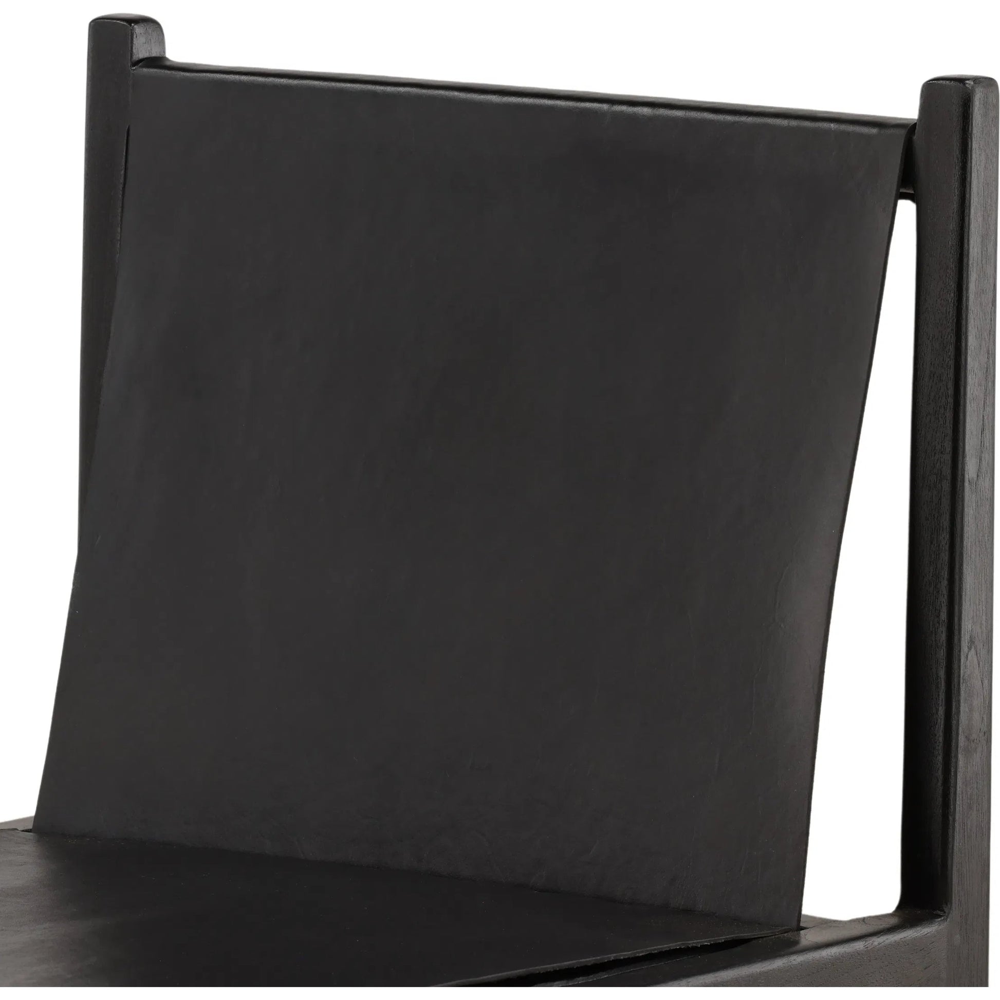 Leamon Dining Chair by Arch & Plane in black. Made from geniune leather, teak wood in a unique style.