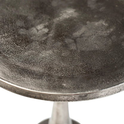 Lyda Side Table by Arch & Plane in raw nickel with black patina finish. Made from cast aluminum in a modern style.