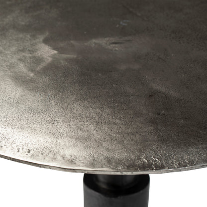 Blake Industrial Bistro Table by Arch & Plane in silver and raw nickel with black patina finish. Made from cast aluminum in a modern style.