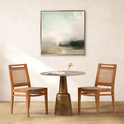 Evie Antique Brass Pedestal Bistro Table by Arch & Plane in antique brass. Made from cast aluminum in a modern style.