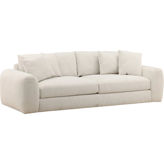 Braedon Sofa by Arch & Plane in naples cream. Made from micro boucle fabric, rubber wood in a unique style.