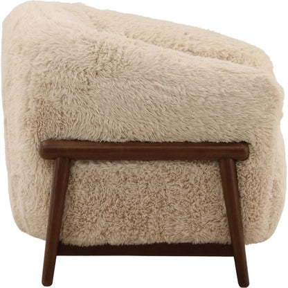 Nila Occasional Chair by Arch & Plane in cream, dark brown. Made from faux fur fabric, rubber wood in a unique style.