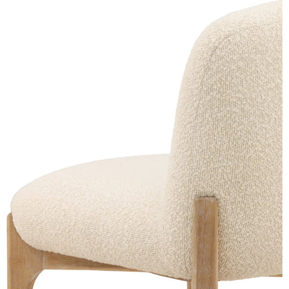 Susan Dining Chair (Set of 2) by Arch & Plane in cream, natural. Made from chunky boucle fabric, rubber wood in a unique style.