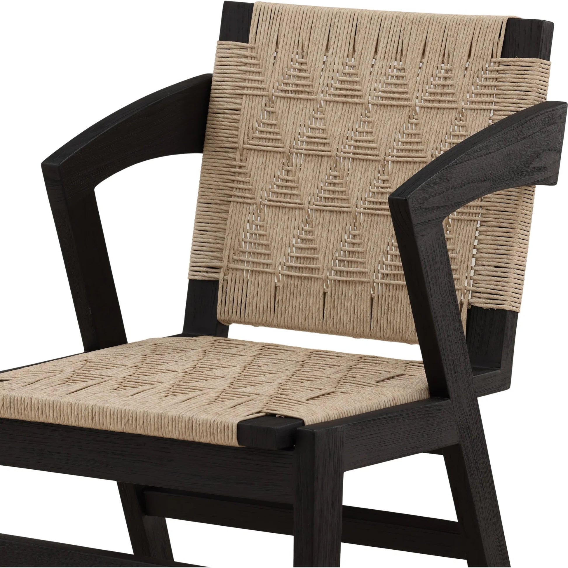 Annamae Dining Chair by Arch & Plane in sand, black. Made from synthetic wicker, teak wood in a unique style.