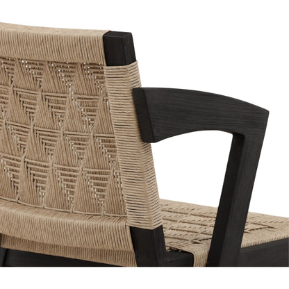 Annamae Dining Chair by Arch & Plane in sand, black. Made from synthetic wicker, teak wood in a unique style.
