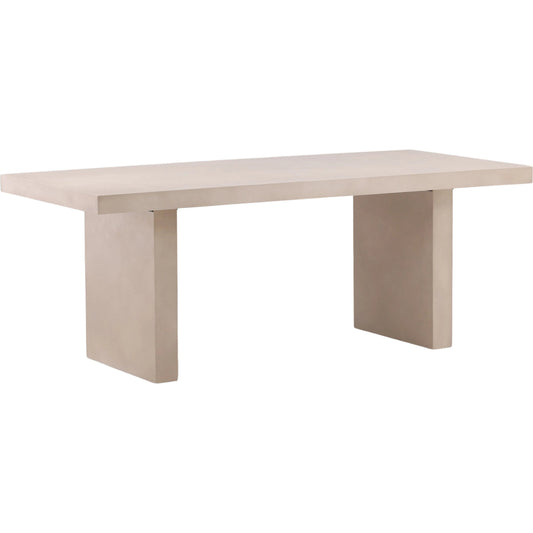 Candi Outdoor Dining Table by Arch & Plane in sand. Made from lightweight concrete in a unique style.