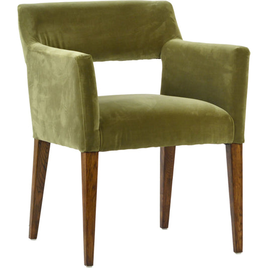Huey Dining Chair by Arch & Plane in olive green fabric, brown wood finish. Made from velvet polyester blend upholstery, oak wood legs in a unique style.