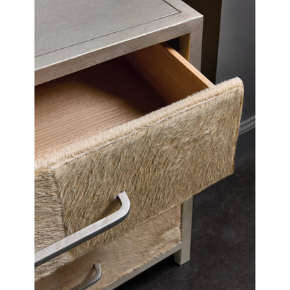 Melange Holy Cow Chest by Hooker Furniture in silver metal, beige hair on hide leather. Made from wood, metal, hair on hide leather in a transitional style.