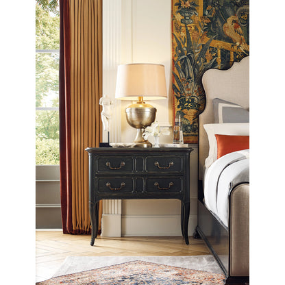 Charleston Two-Drawer Nightstand by Hooker Furniture in black cherry. Made from cherry veneers with solid-wood edge top in a transitional style.