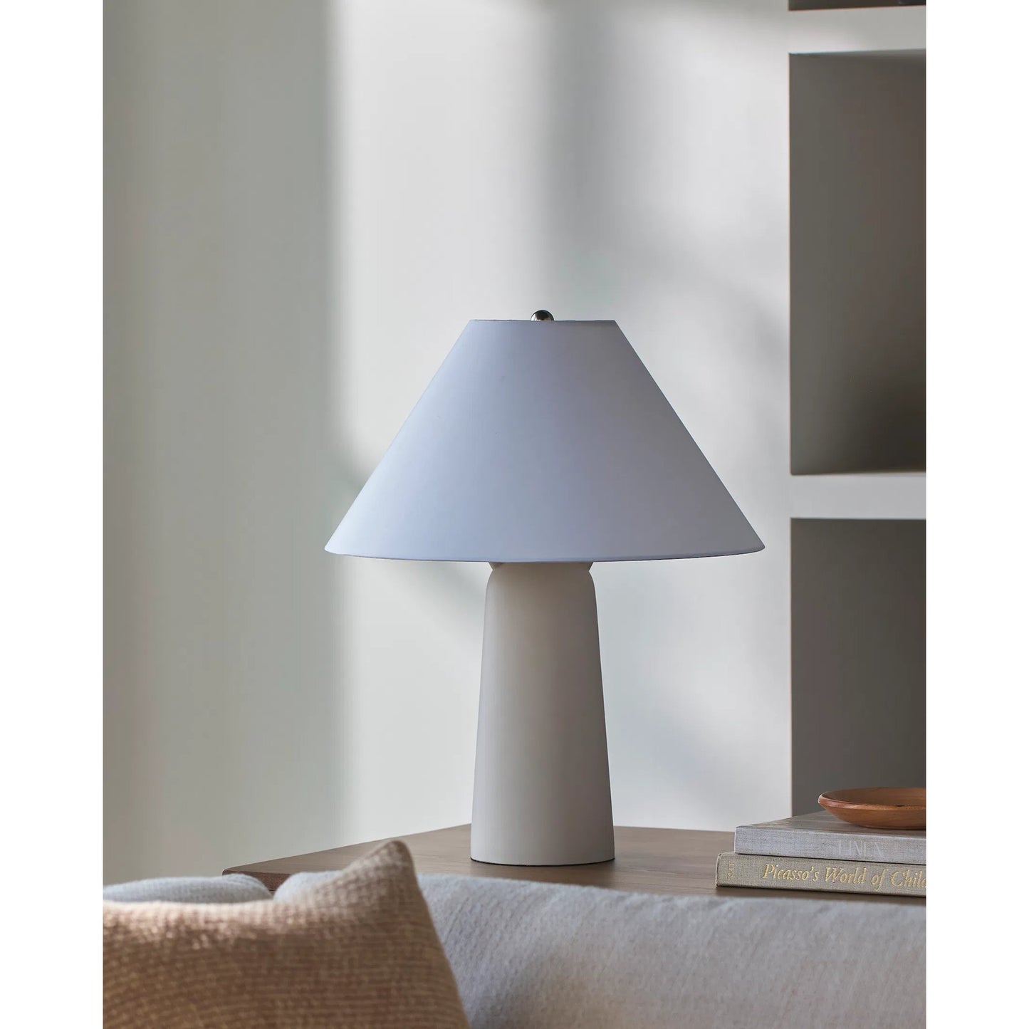 003 SI-2258322 | Lifestyle | Deva Accent Table Lamp by Livabliss in gray and hand painted. Made from concrete, cotton, iron in a transitional style.