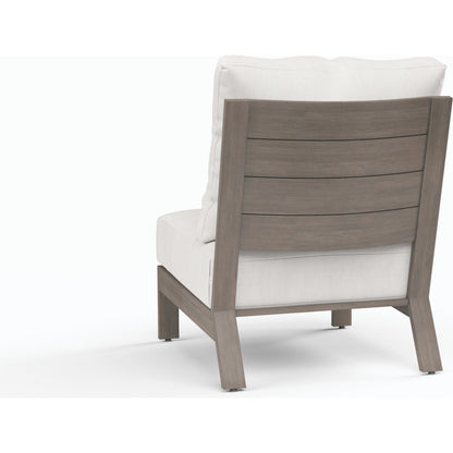 Laguna Outdoor Armless Club in Canvas Flax by Sunset West in browns. Made from aluminum in a modern style.