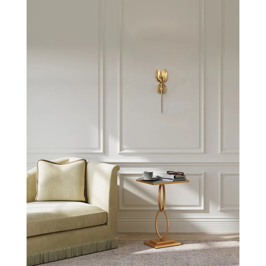 Protea Wall Sconce by Currey and Company in brass. Made from metal in a modern style.