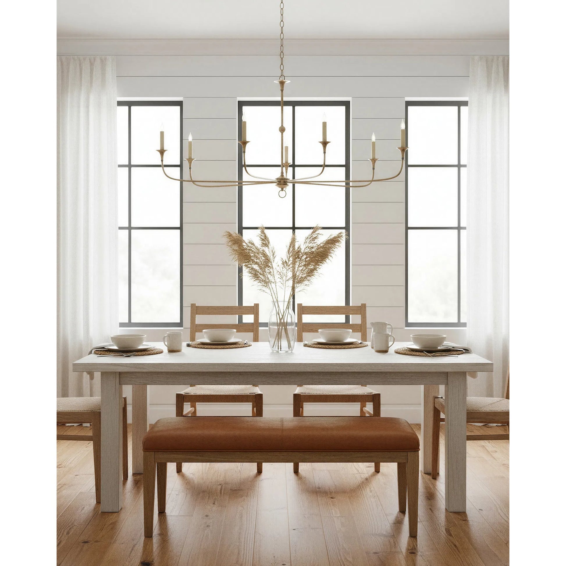 Nottaway Chandelier by Currey and Company. Made from wrought iron in a modern style.