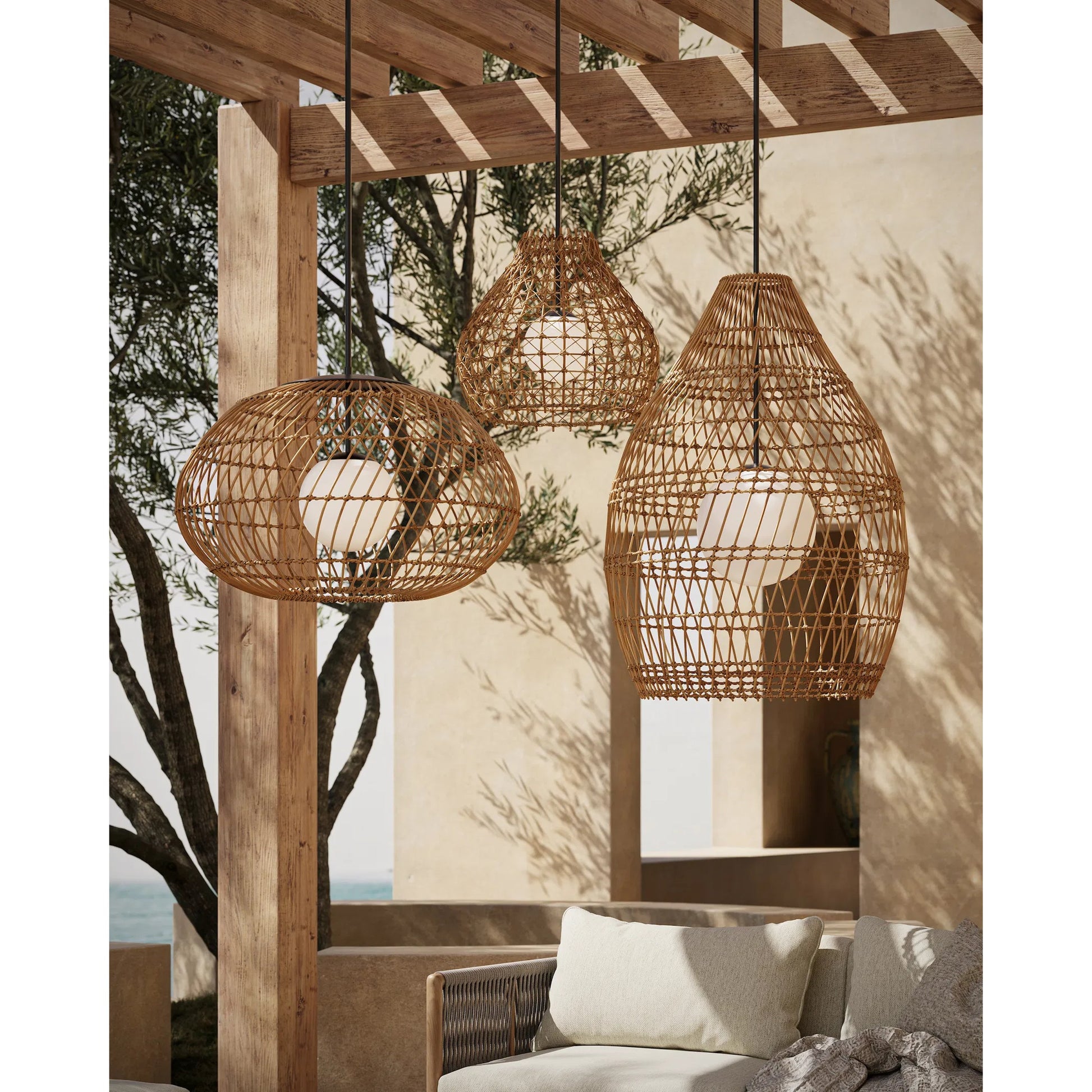 Fishtrap Outdoor Pendant by Currey and Company in natural, black, frosted white. Made from all-weather wicker, metal, glass in a unique style.