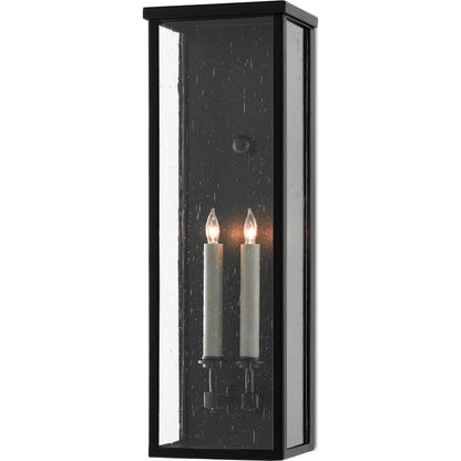 Tanzy Outdoor Wall Sconce by Currey and Company in midnight. Made from wrought iron, seeded glass in a transitional style.