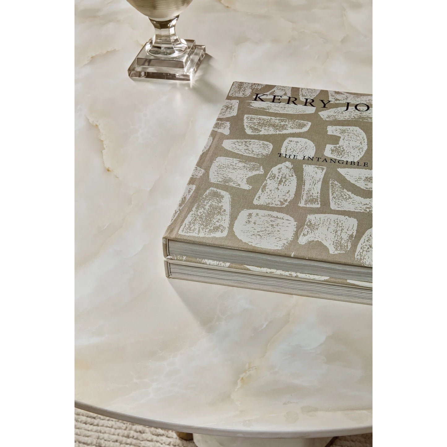 003 SI-2458563 | Closeup | Eleana Round Dining Table by Hooker Furniture in faux onyx. Made from concrete, resin, metal in a modern style.