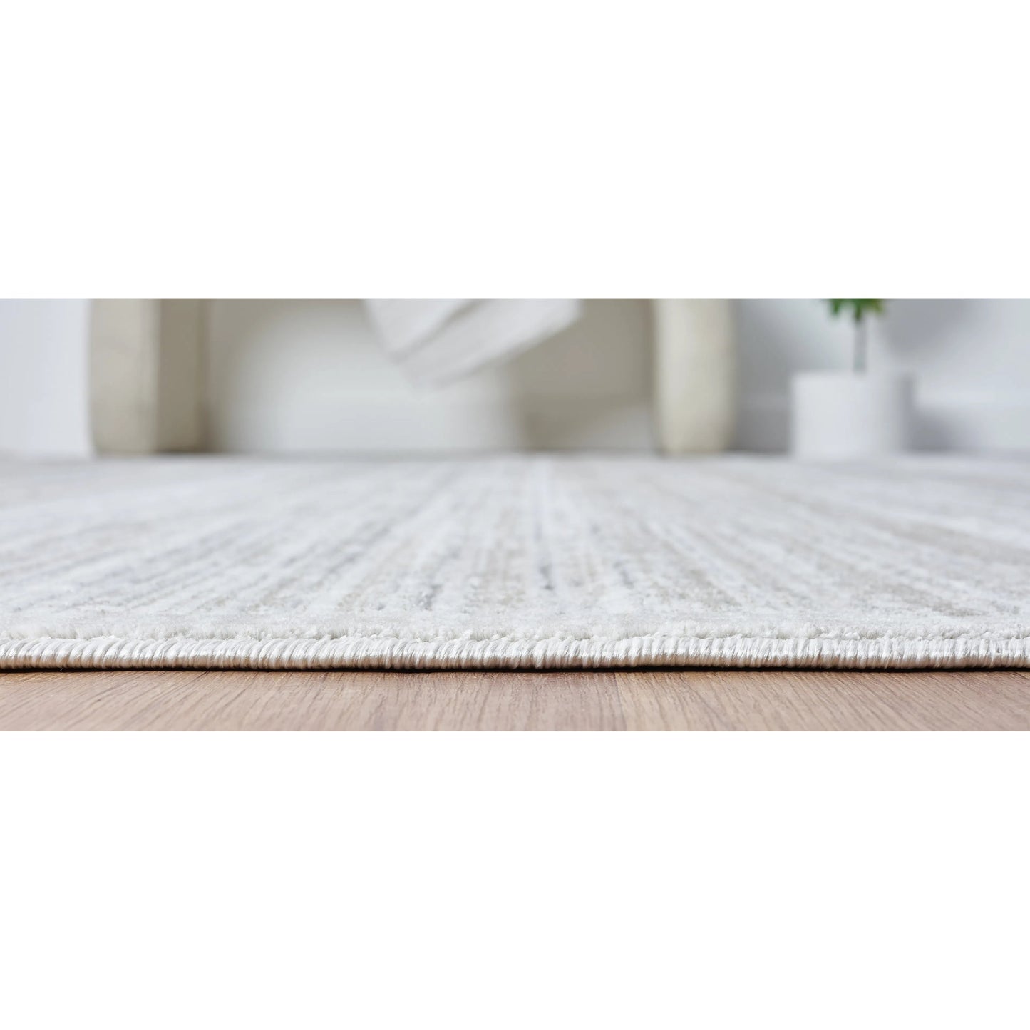 008 SI-2633684,SI-2633685,SI-2633686,SI-2633687,SI-2633688,SI-2633689 | Closeup | Ember Rug - EB2002 by Kalaty in grey. Made from polyester in a unique style.