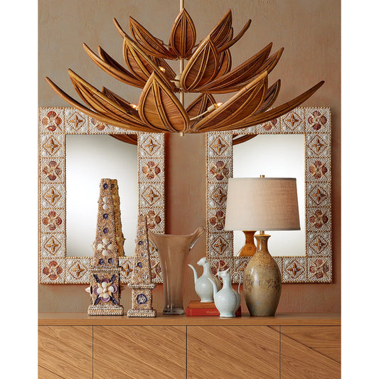 Stellata Table Lamp by Currey and Company in ochre. Made from ceramic in a unique style.