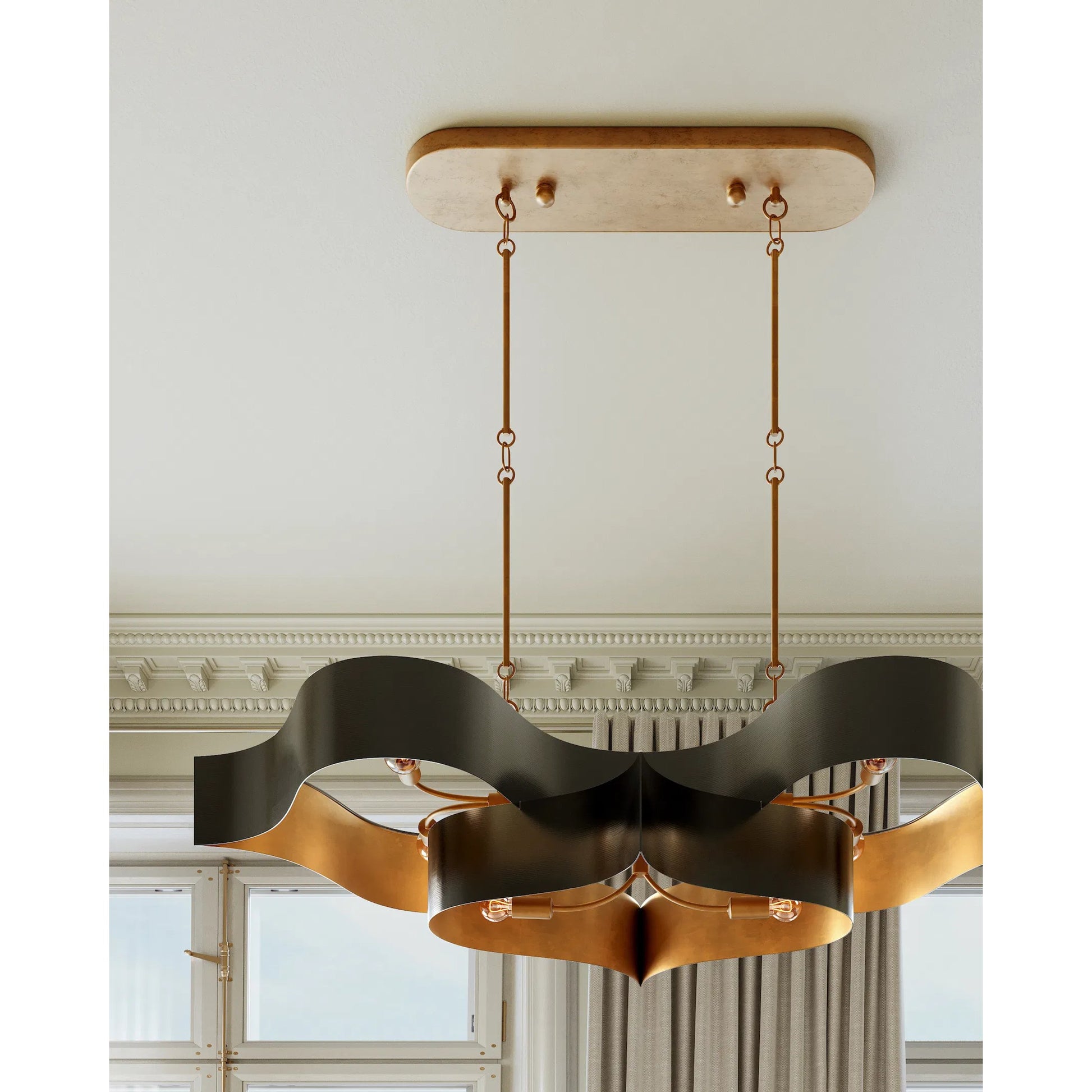 Grand Lotus Oval Chandelier by Currey and Company. Made from wrought iron in a modern style.