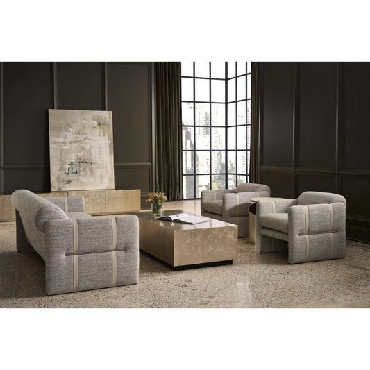 Cigar Club Sofa by Caracole in brushed gold. Made from birch in a unique style.