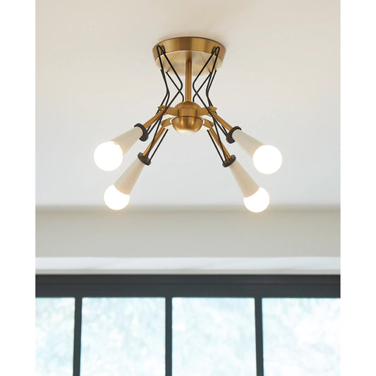 Piro Flush Mount by Visual Comfort & Co. in burnished brass. Made from steel in a unique style.