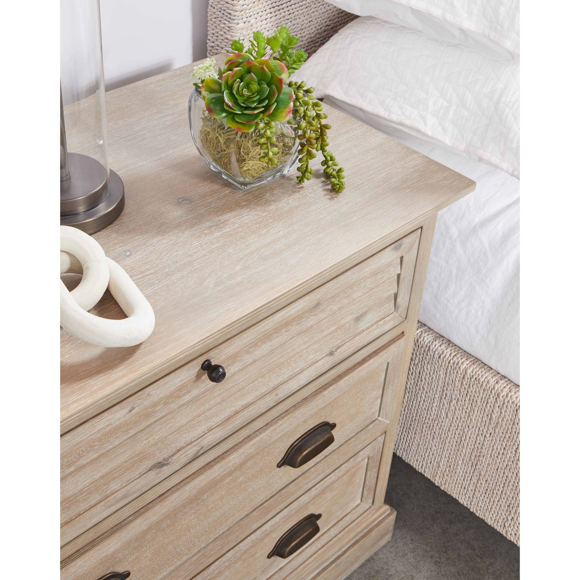 Eden 3-Drawer Nightstand by Essentials For Living in natural gray acacia. Made from solid acacia wood, acacia veneer, mdf, plywood, solid rubberwood, metal in a traditional style.
