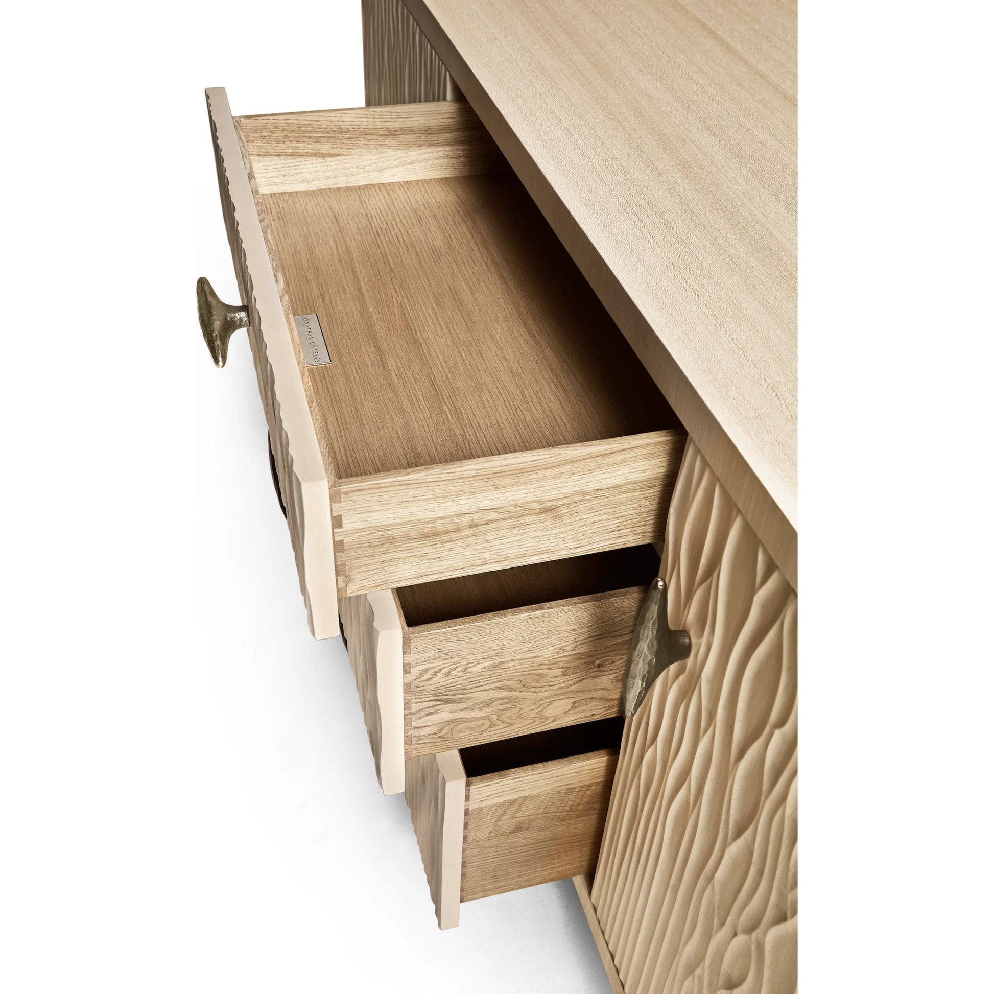 Water Breaker Mixed Media Credenza by Jonathan Charles in beige and ash blonde. Made from dyed koto veneer, bone, leather, metal in a transitional style.