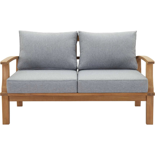 Andover Teak Loveseat by Evans & Londeen. Made from teak wood, cushion density is 24kg, m3 in a modern style.