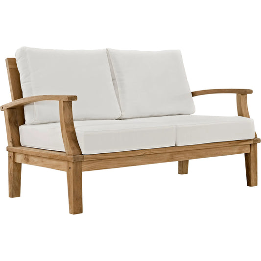 Andover Teak Loveseat by Evans & Londeen. Made from teak wood, cushion density is 24kg, m3 in a modern style.