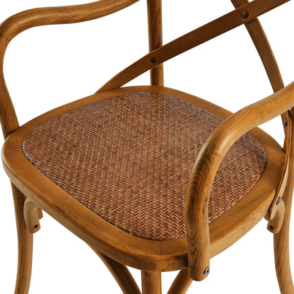 Easton Dining Armchair by Evans & Londeen in walnut. Made from chinese toon, plywood, rattan in a cottage & farmhouse style.
