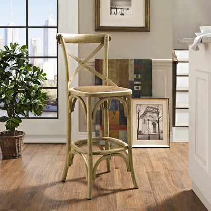Easton Bar Stool by Evans & Londeen. Made from edge chinese elm wood, middle p2 plywood, top rattan, white foot pins in a cottage & farmhouse style.