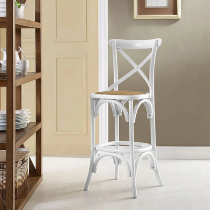 Easton Bar Stool by Evans & Londeen. Made from edge chinese elm wood, middle p2 plywood, top rattan, white foot pins in a cottage & farmhouse style.