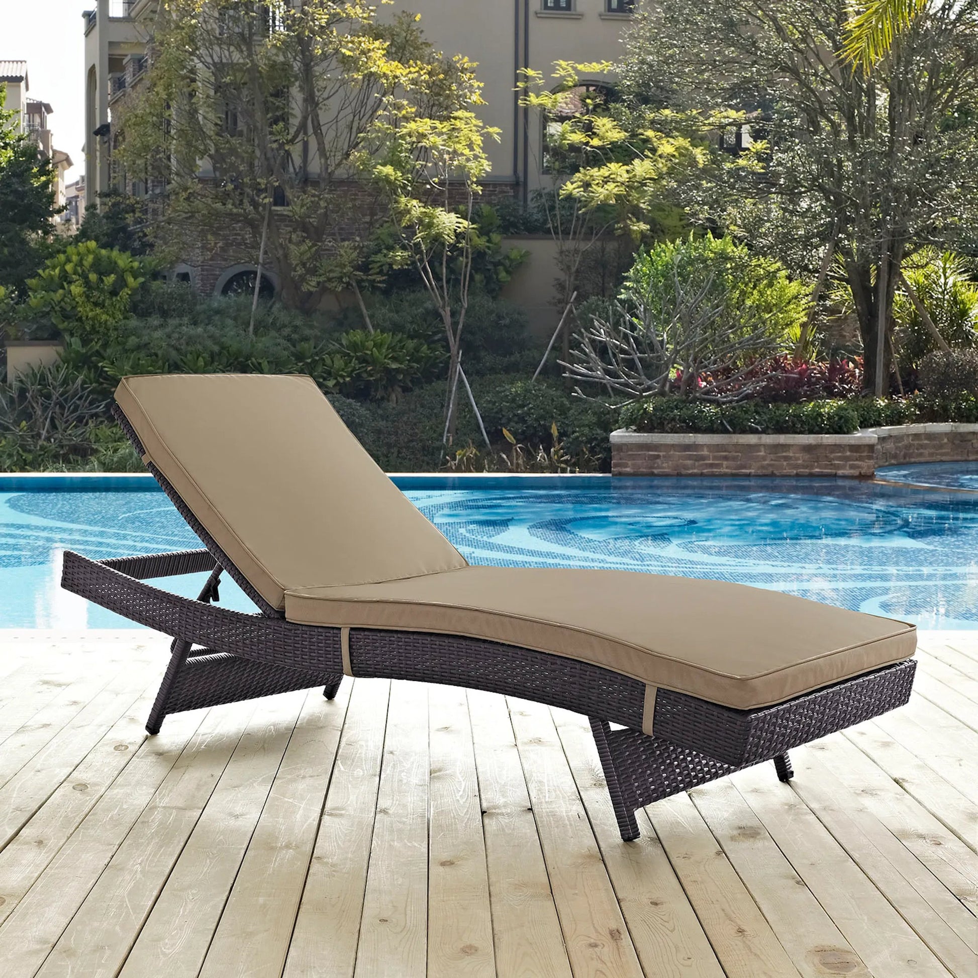 Amelia Outdoor Patio Chaise by Evans & Londeen. Made from synthetic rattan weave, powder coated aluminum, cushion density is 24kg, m3 in a modern style.