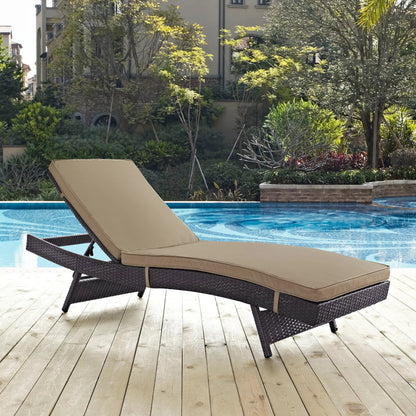 Amelia Outdoor Patio Chaise by Evans & Londeen. Made from synthetic rattan weave, powder coated aluminum, cushion density is 24kg, m3 in a modern style.