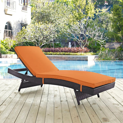 Amelia Outdoor Patio Chaise by Evans & Londeen. Made from synthetic rattan weave, powder coated aluminum, cushion density is 24kg, m3 in a modern style.