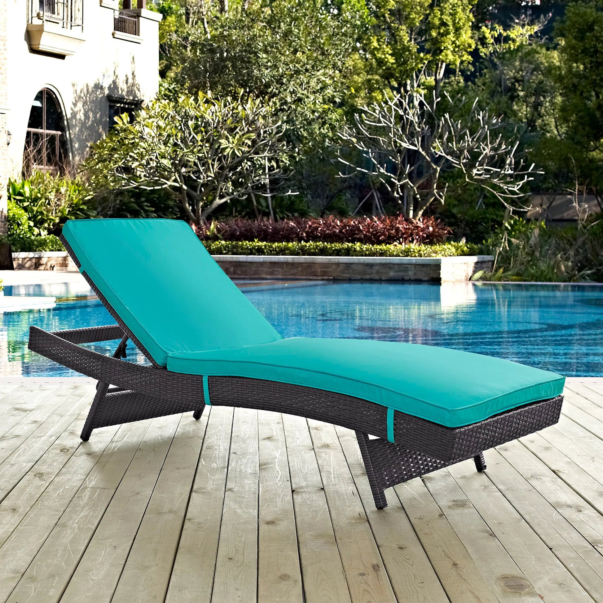 Amelia Outdoor Patio Chaise by Evans & Londeen. Made from synthetic rattan weave, powder coated aluminum, cushion density is 24kg, m3 in a modern style.