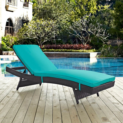 Amelia Outdoor Patio Chaise by Evans & Londeen. Made from synthetic rattan weave, powder coated aluminum, cushion density is 24kg, m3 in a modern style.