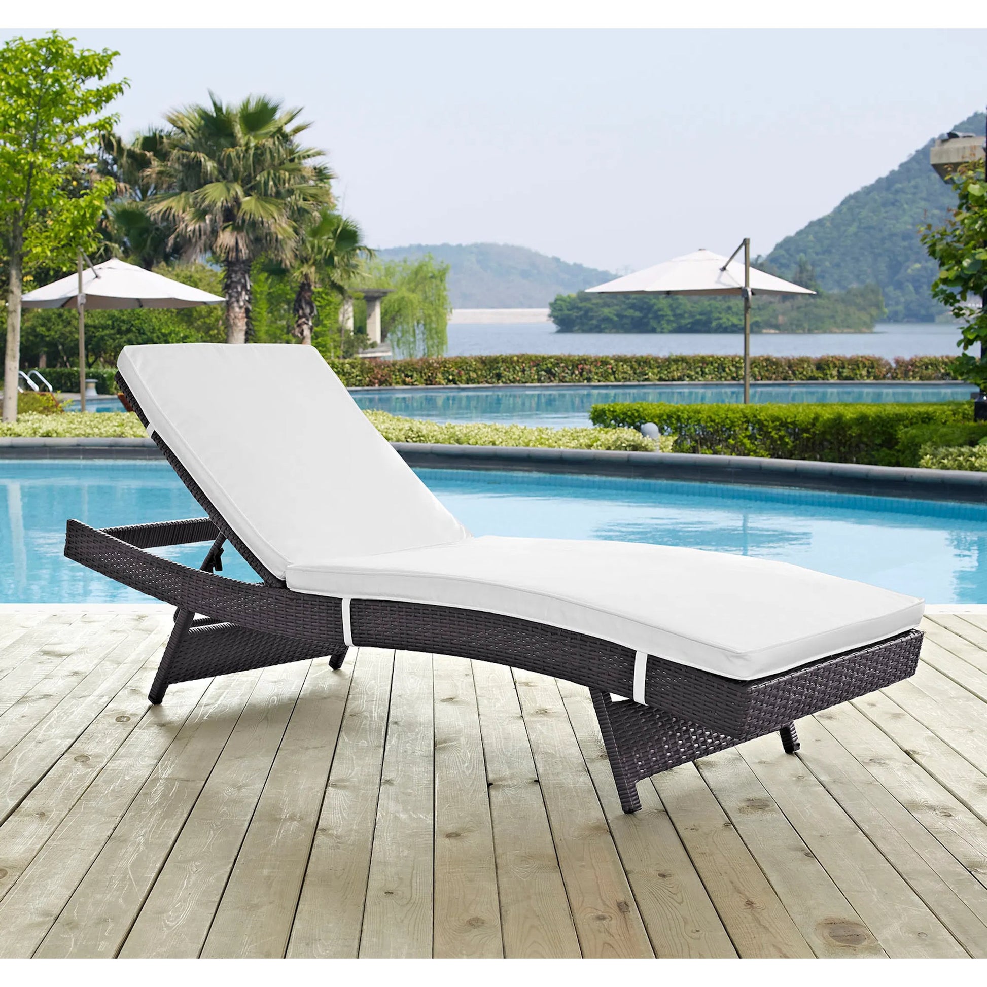 Amelia Outdoor Patio Chaise by Evans & Londeen. Made from synthetic rattan weave, powder coated aluminum, cushion density is 24kg, m3 in a modern style.