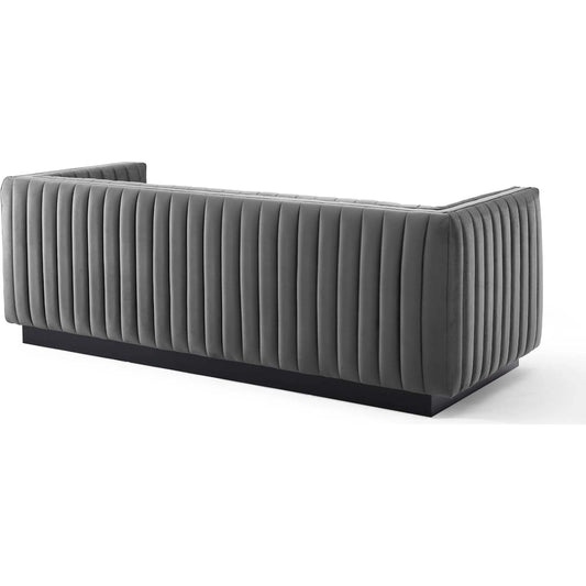 Stone Channel Sofa by Evans & Londeen in gray. Made from spring pocket inside the seat cushion, seat cushion foam density 28kgs, m3, yuhua velvet fabric, polyester, solid wood frame in a modern style.