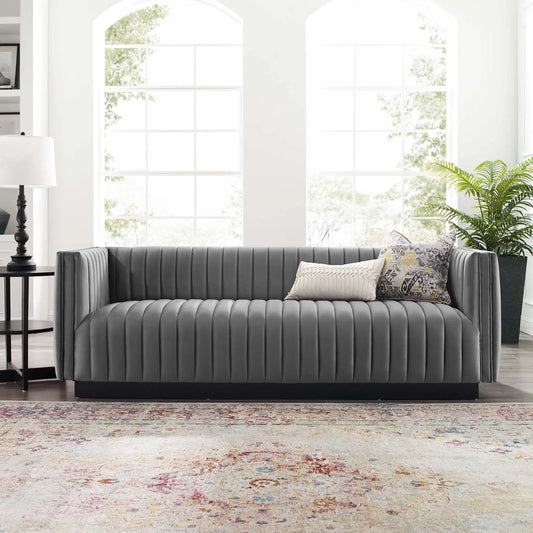 Stone Channel Sofa by Evans & Londeen in gray. Made from spring pocket inside the seat cushion, seat cushion foam density 28kgs, m3, yuhua velvet fabric, polyester, solid wood frame in a modern style.