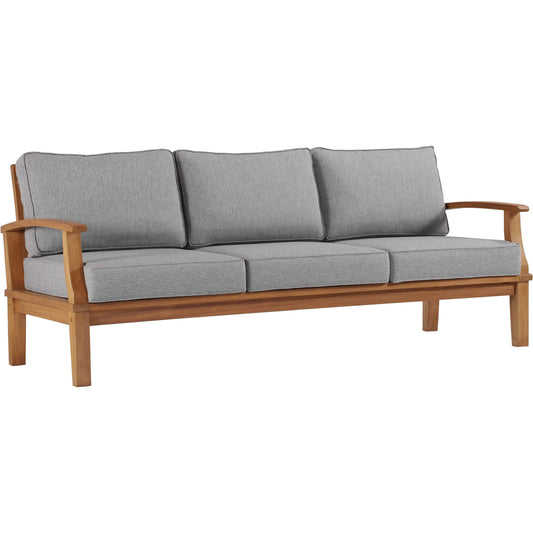 Andover Teak Sofa by Evans & Londeen. Made from density 22 foam in a coastal style.